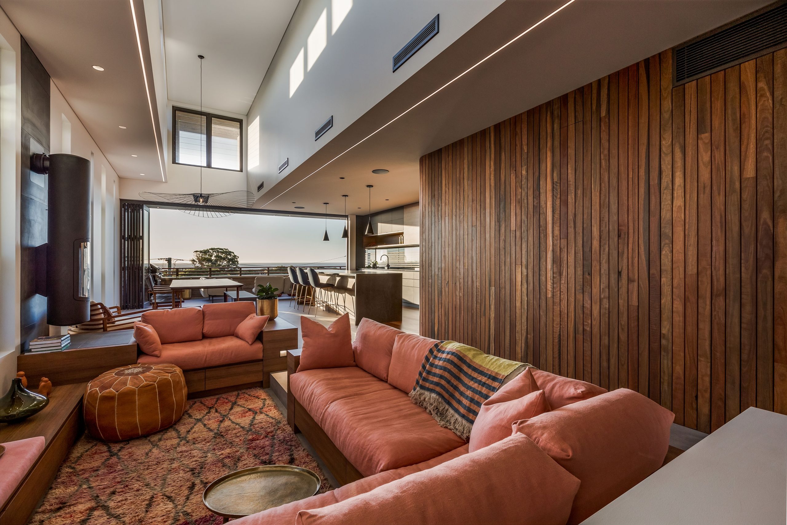 Living room with beautiful timber walls