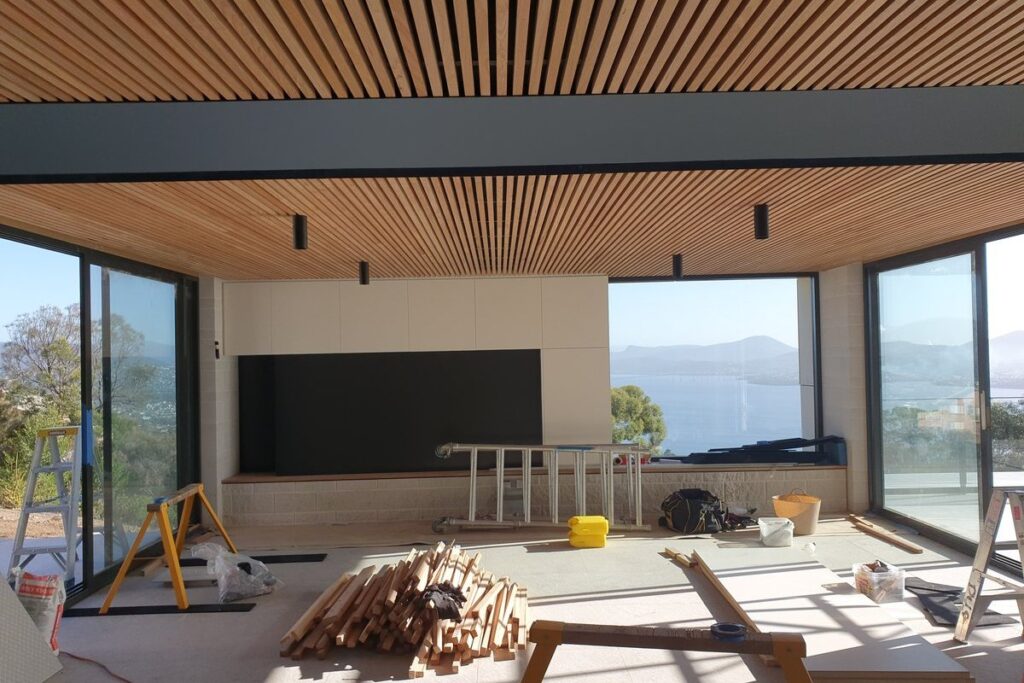 Vacoa timber Proplank ceiling battens in a Hobart home, framing a view over the harbour